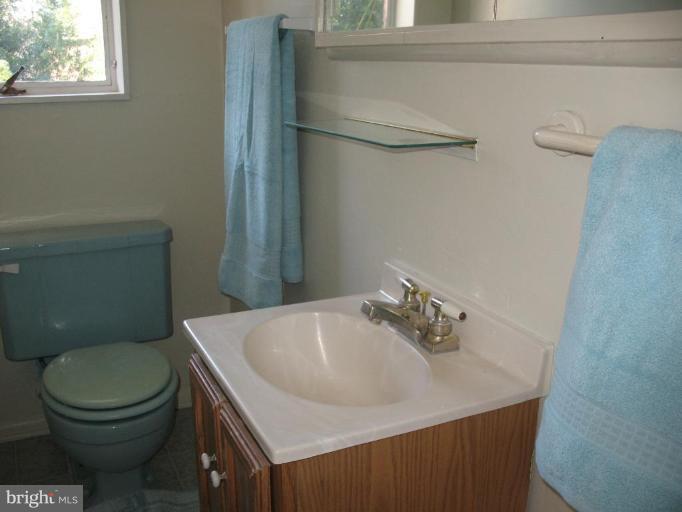 5403 Littleford Street Springfield, VA 22151 - Photo 15 of 21 a bathroom with a sink and a toilet