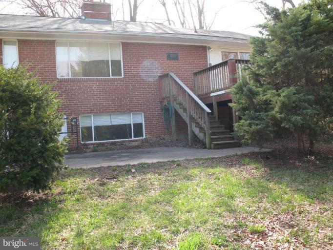 5403 Littleford Street Springfield, VA 22151 - Photo 16 of 21 a front view of a house with a yard