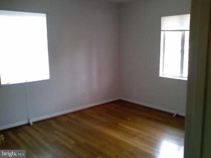 5403 Littleford Street Springfield, VA 22151 - Photo 6 of 21 an empty room with a window