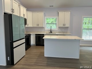 11411 Winterpock Road Chesterfield, VA 23838 - Photo 7 of 16 a kitchen with a sink cabinets stainless steel appliances and a window