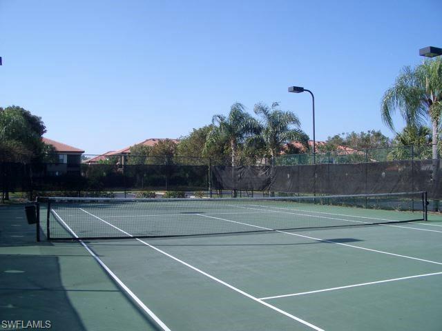 1210 Reserve Way, Unit 9203 Naples, FL 34105 - Photo 14 of 18 a view of basketball court