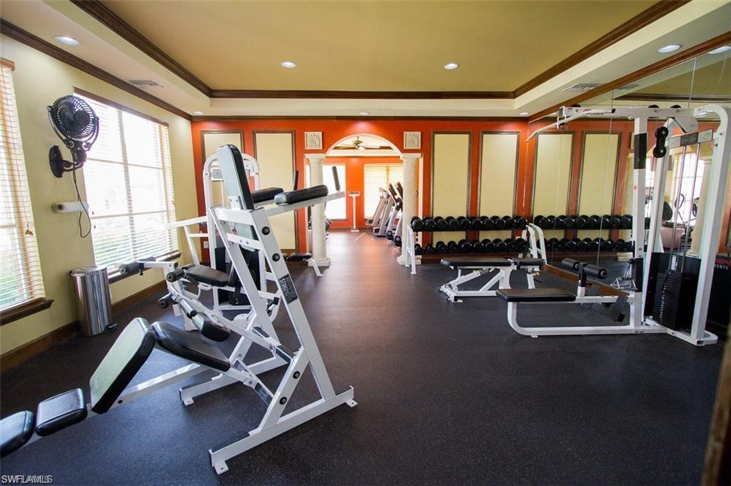 1210 Reserve Way, Unit 9203 Naples, FL 34105 - Photo 16 of 18 a view of a room with gym equipment