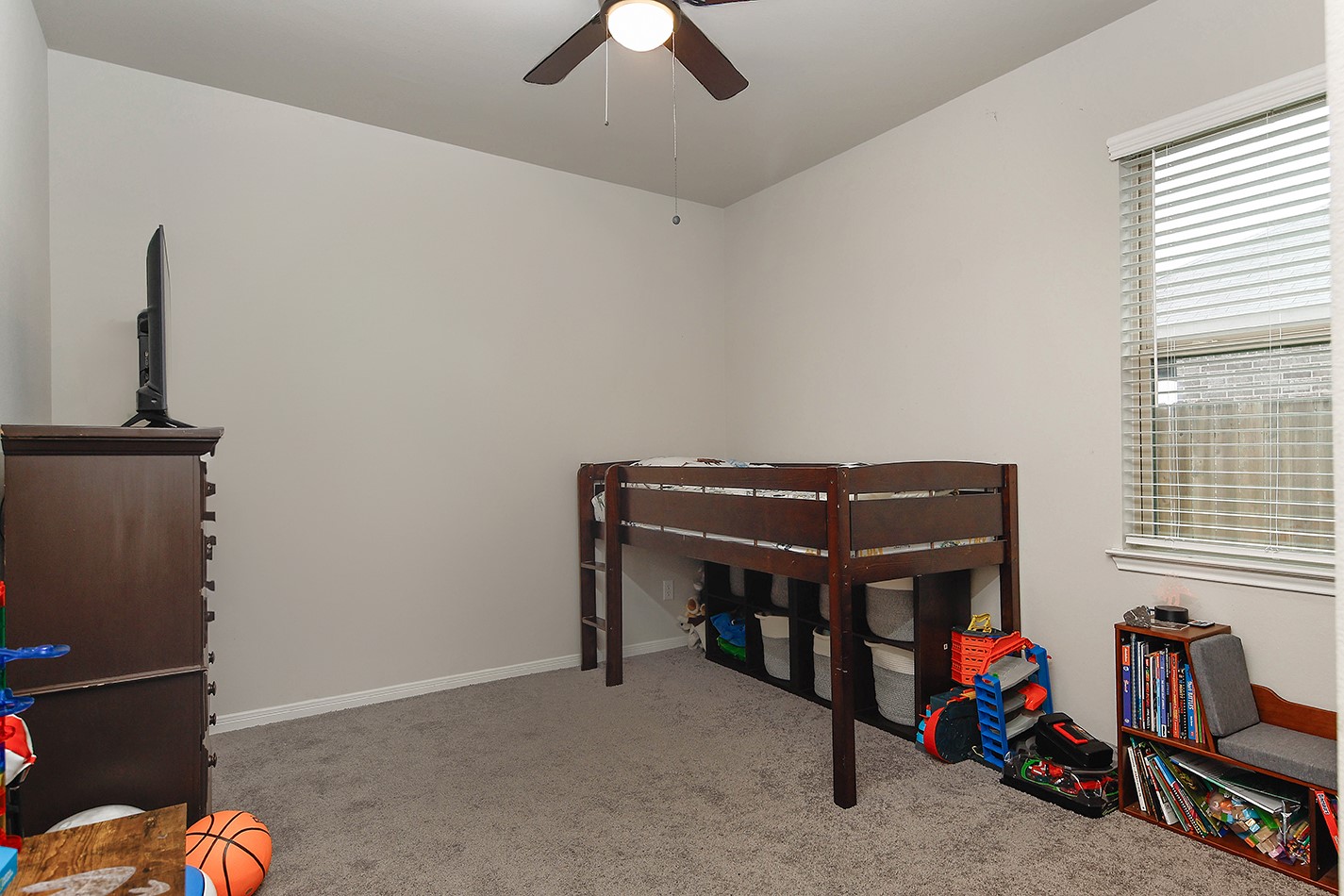 26324 Cooperstown Way Splendora, TX 77372 - Photo 18 of 23 a room with storage space
