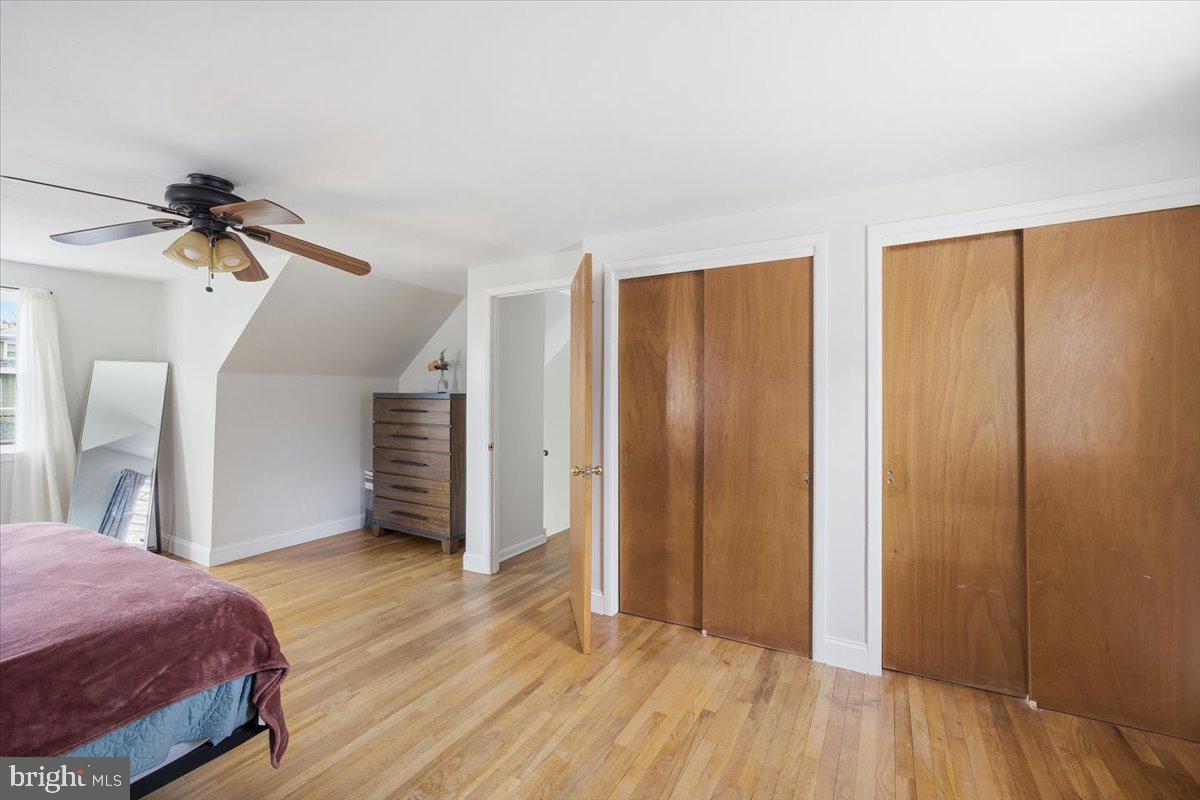 35 Rosedale Avenue Ewing, NJ 08638 - Photo 28 of 35 a view of a bedroom with a bed and wooden floor