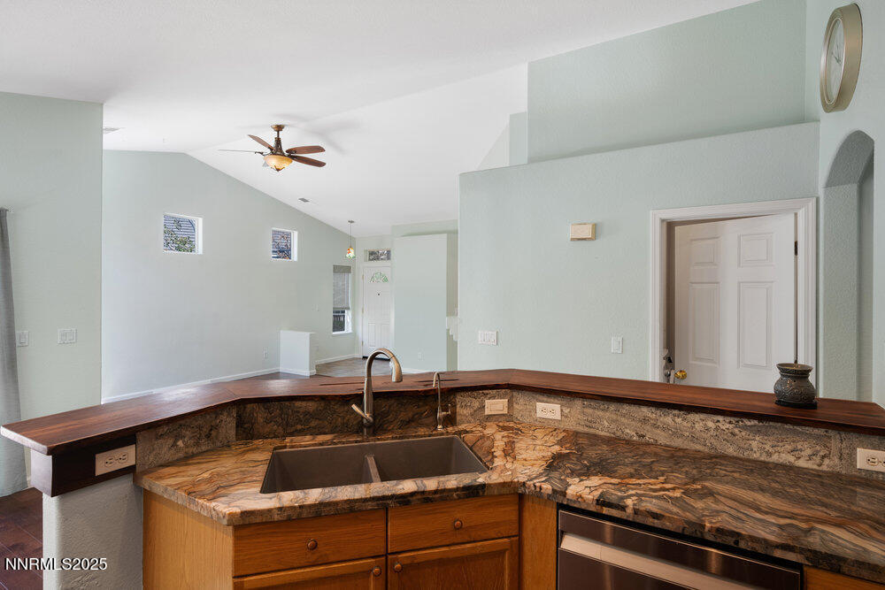 1706 River Gorge Court Reno, NV 89521 - Photo 12 of 40 a bathroom with a sink and a mirror