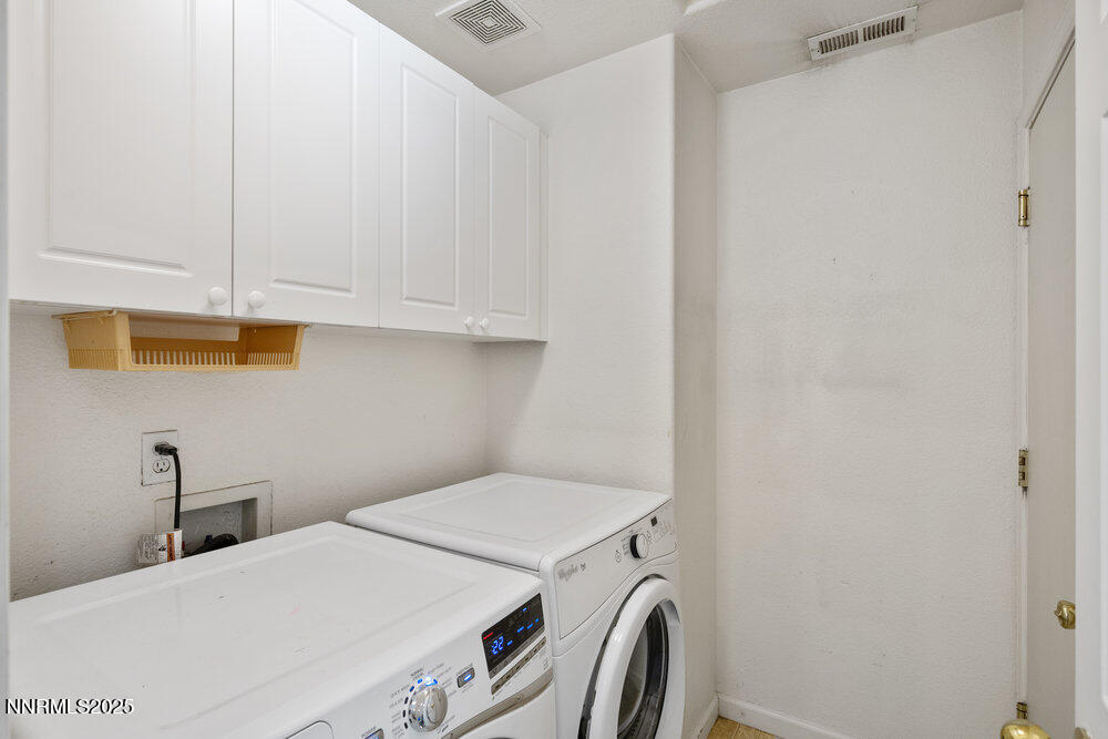 1706 River Gorge Court Reno, NV 89521 - Photo 23 of 40 a utility room with dryer and washer