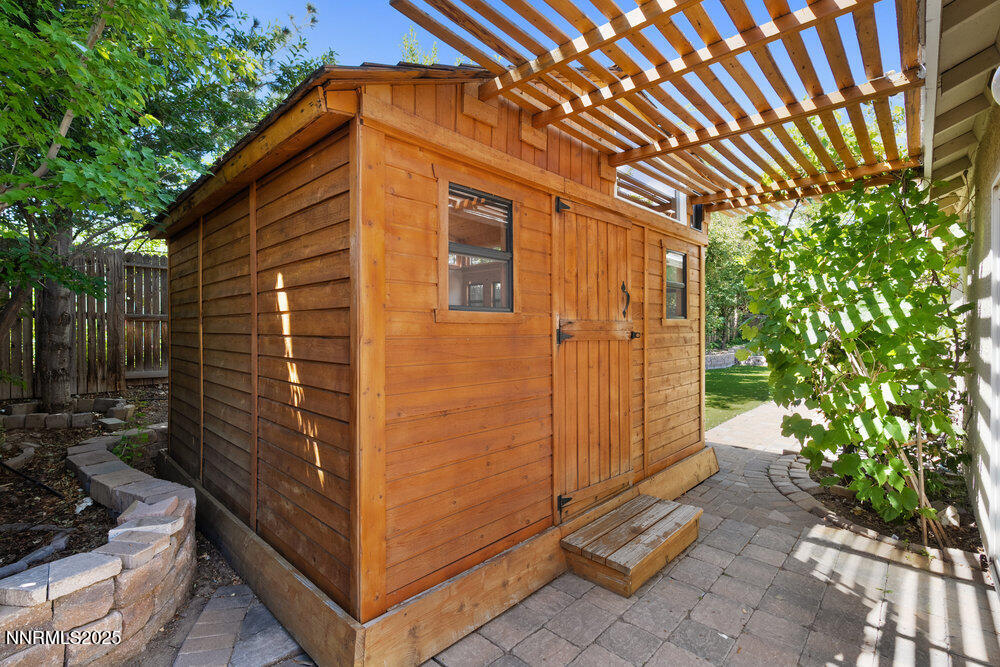 1706 River Gorge Court Reno, NV 89521 - Photo 27 of 40 a view of a house with a backyard
