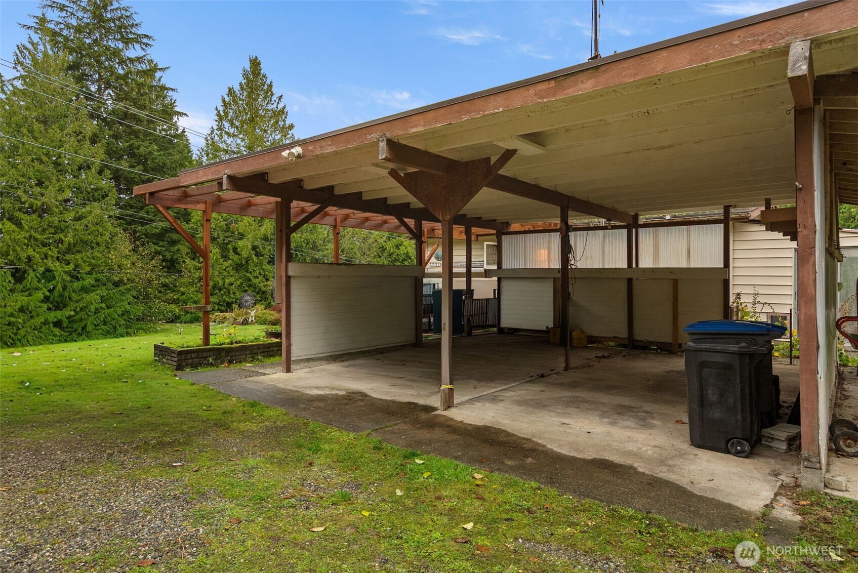 6091 Northeast Twin Spits Road Hansville, WA 98340 - Photo 19 of 34 a view of a backyard