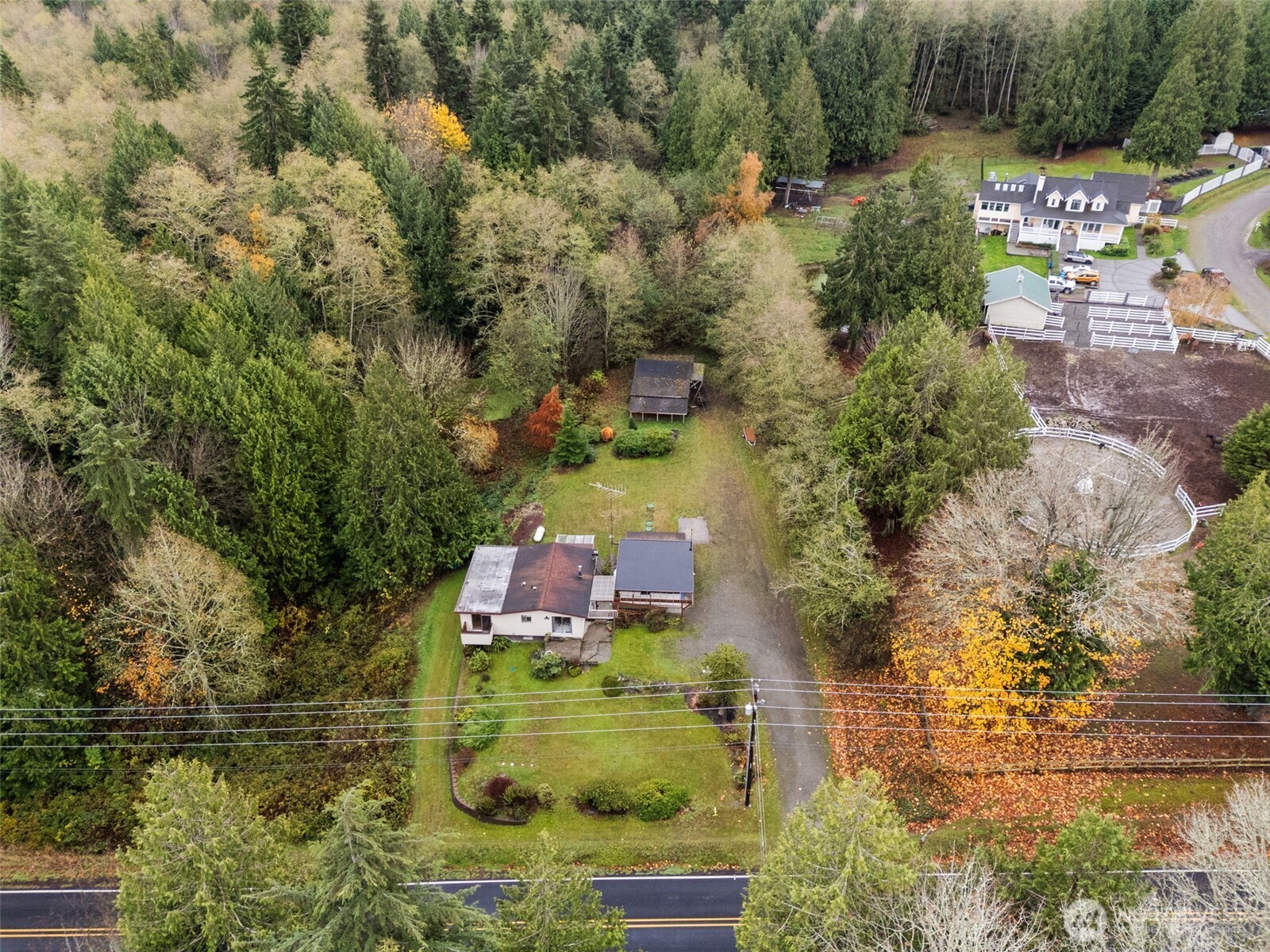 6091 Northeast Twin Spits Road Hansville, WA 98340 - Photo 2 of 34 an aerial view of residential house with outdoor space