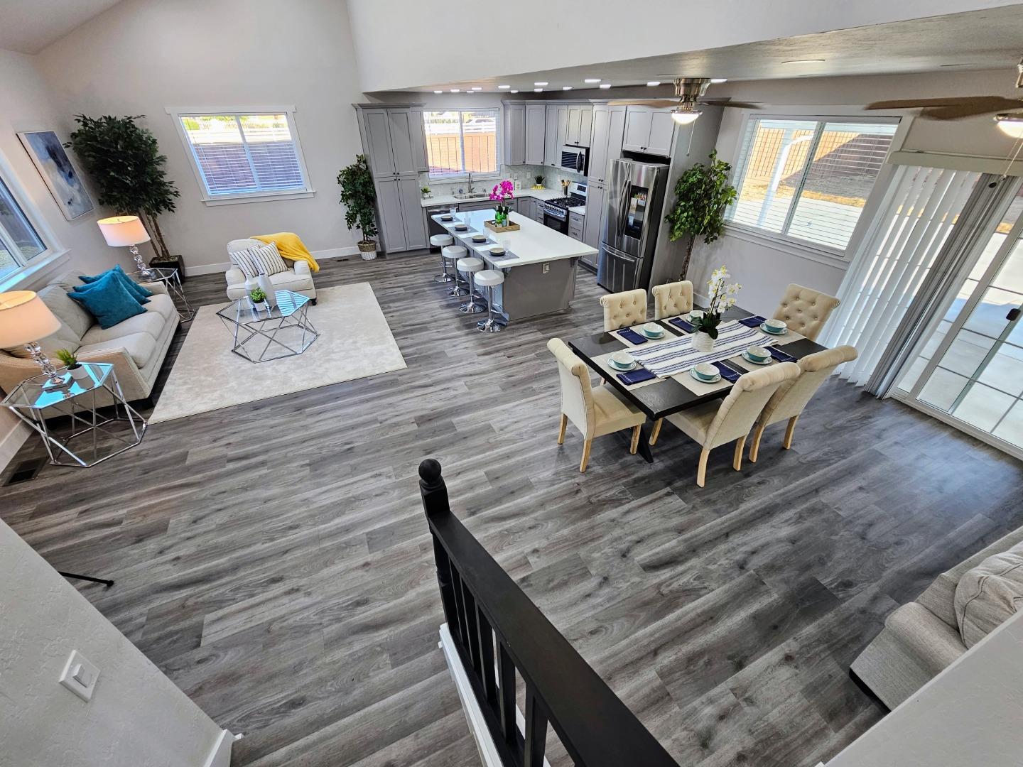 17675 Laurel Road Morgan Hill, CA 95037 - Photo 14 of 49 a living room with furniture wooden floor and a fireplace