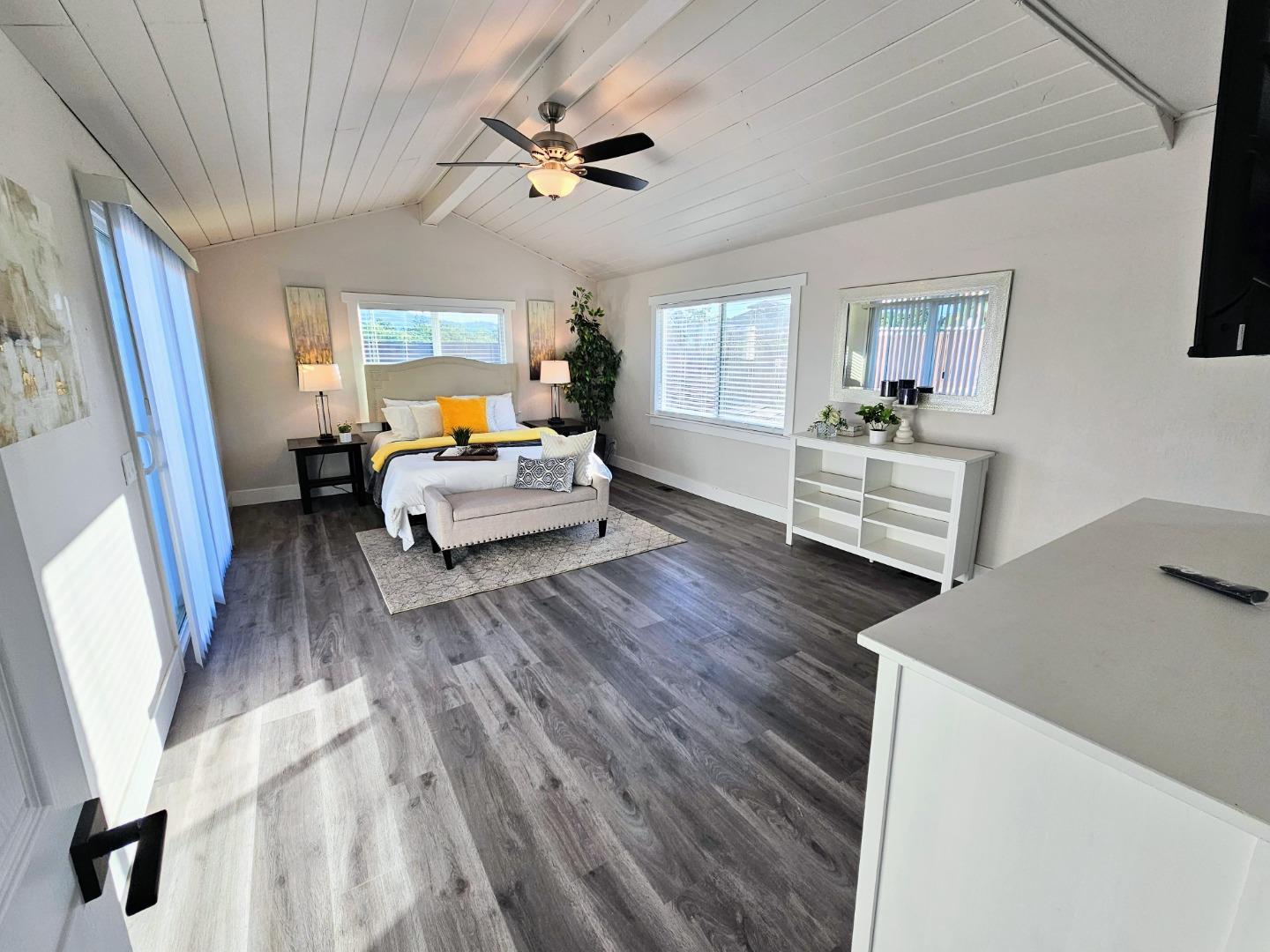 17675 Laurel Road Morgan Hill, CA 95037 - Photo 17 of 49 a living room with furniture and a wooden floor