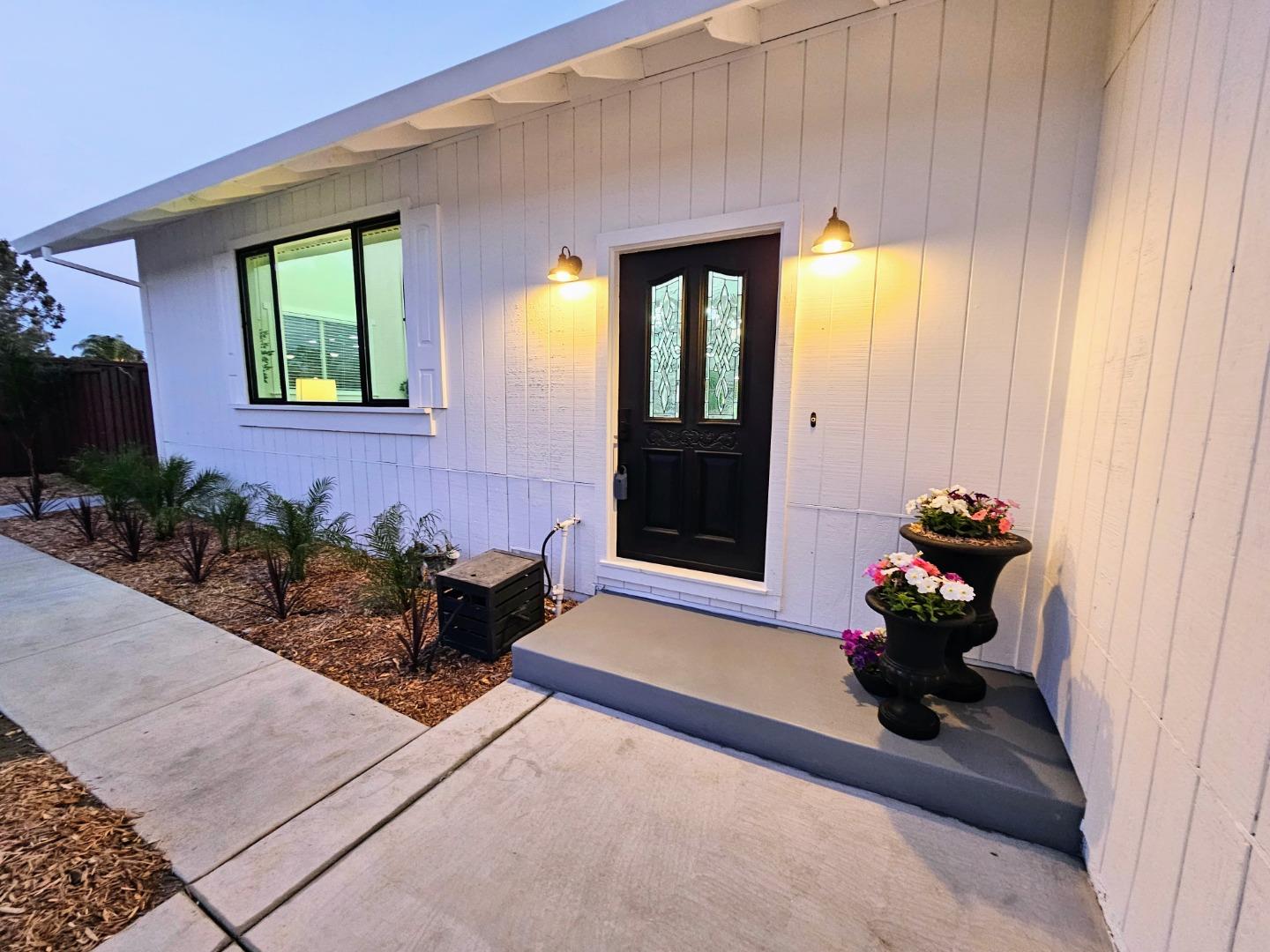 17675 Laurel Road Morgan Hill, CA 95037 - Photo 39 of 49 a living room with furniture and a potted plant