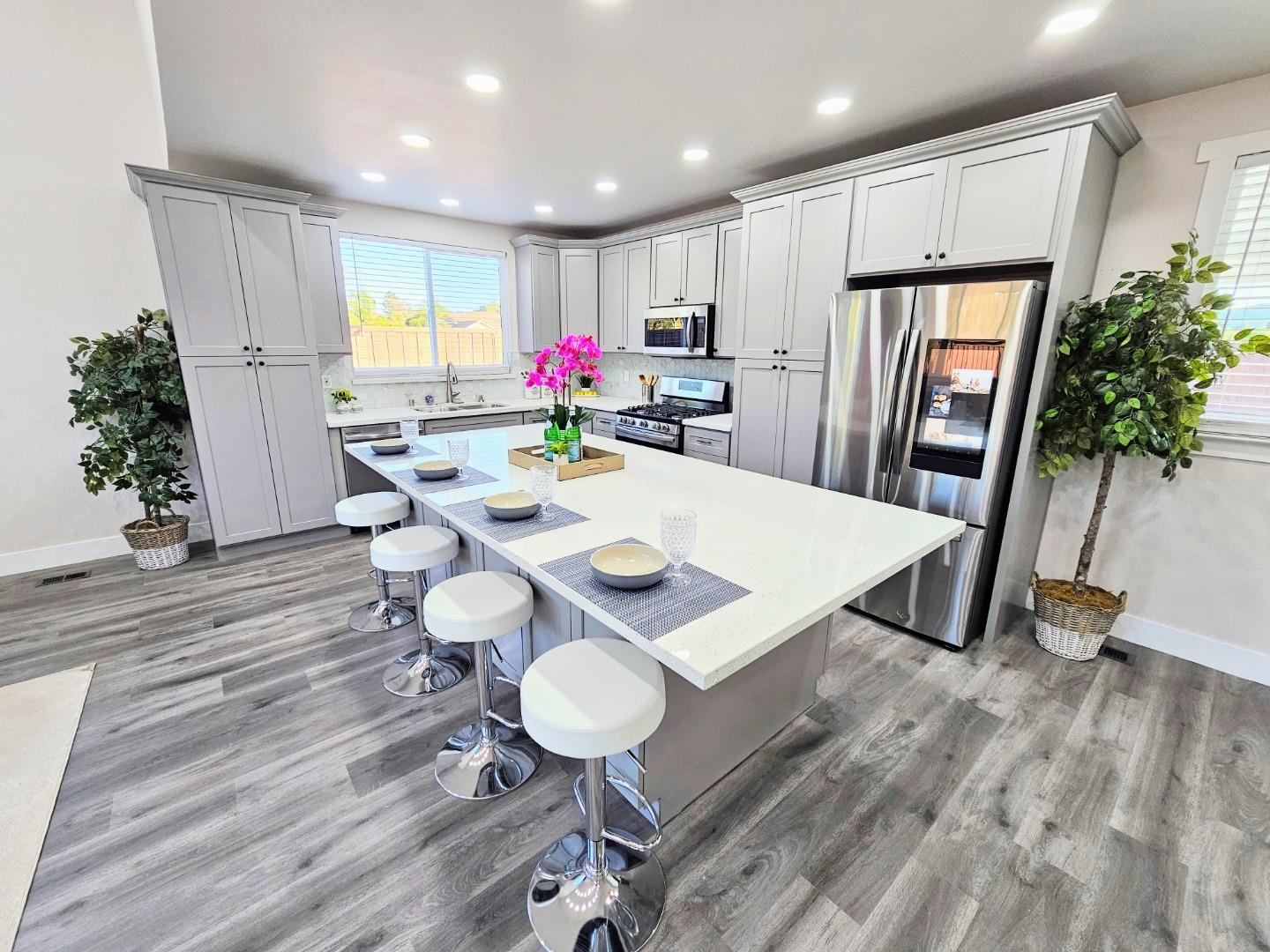 17675 Laurel Road Morgan Hill, CA 95037 - Photo 7 of 49 a view of kitchen with furniture and wooden floor
