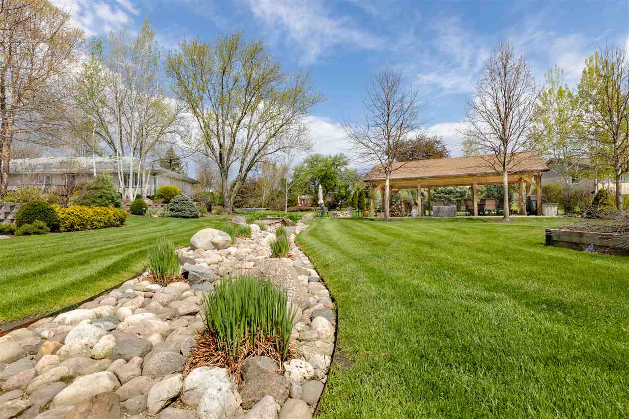 6871 Spring Brook Road Rockford, IL 61114 - Photo 21 of 24 a view of a park with large trees
