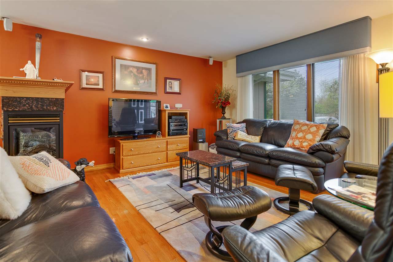 6871 Spring Brook Road Rockford, IL 61114 - Photo 6 of 24 a living room with furniture and a flat screen tv