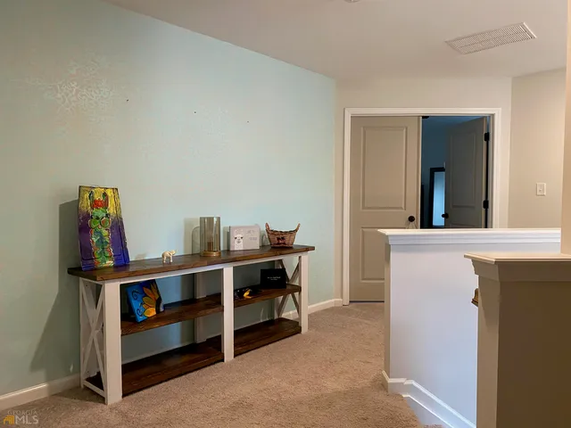 a view of a workspace with furniture