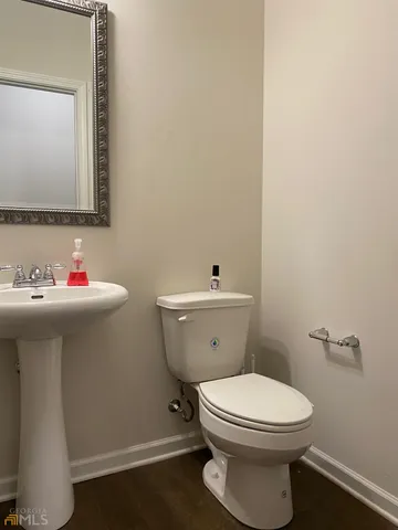 a bathroom with a sink and a toilet