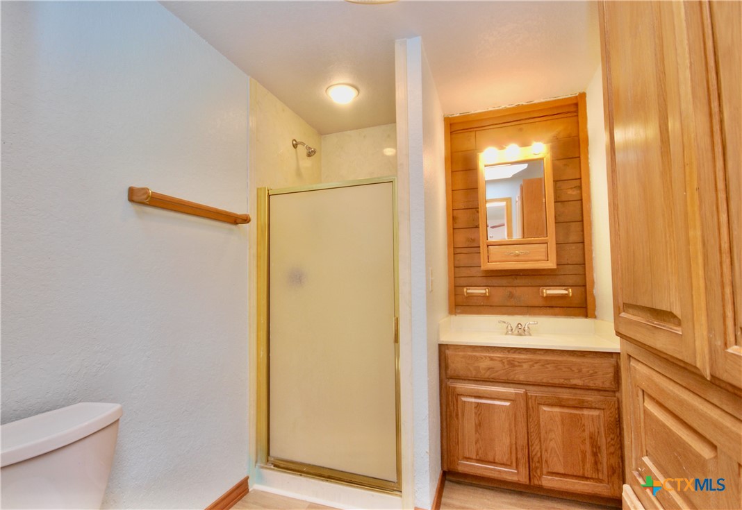 2725 Old Lehmann Road Seguin, TX 78155 - Photo 18 of 47 a bathroom with a shower and a toilet