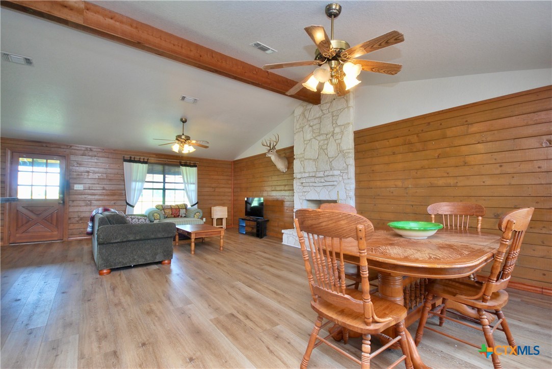 2725 Old Lehmann Road Seguin, TX 78155 - Photo 10 of 47 a view of a dining room with furniture and wooden floor