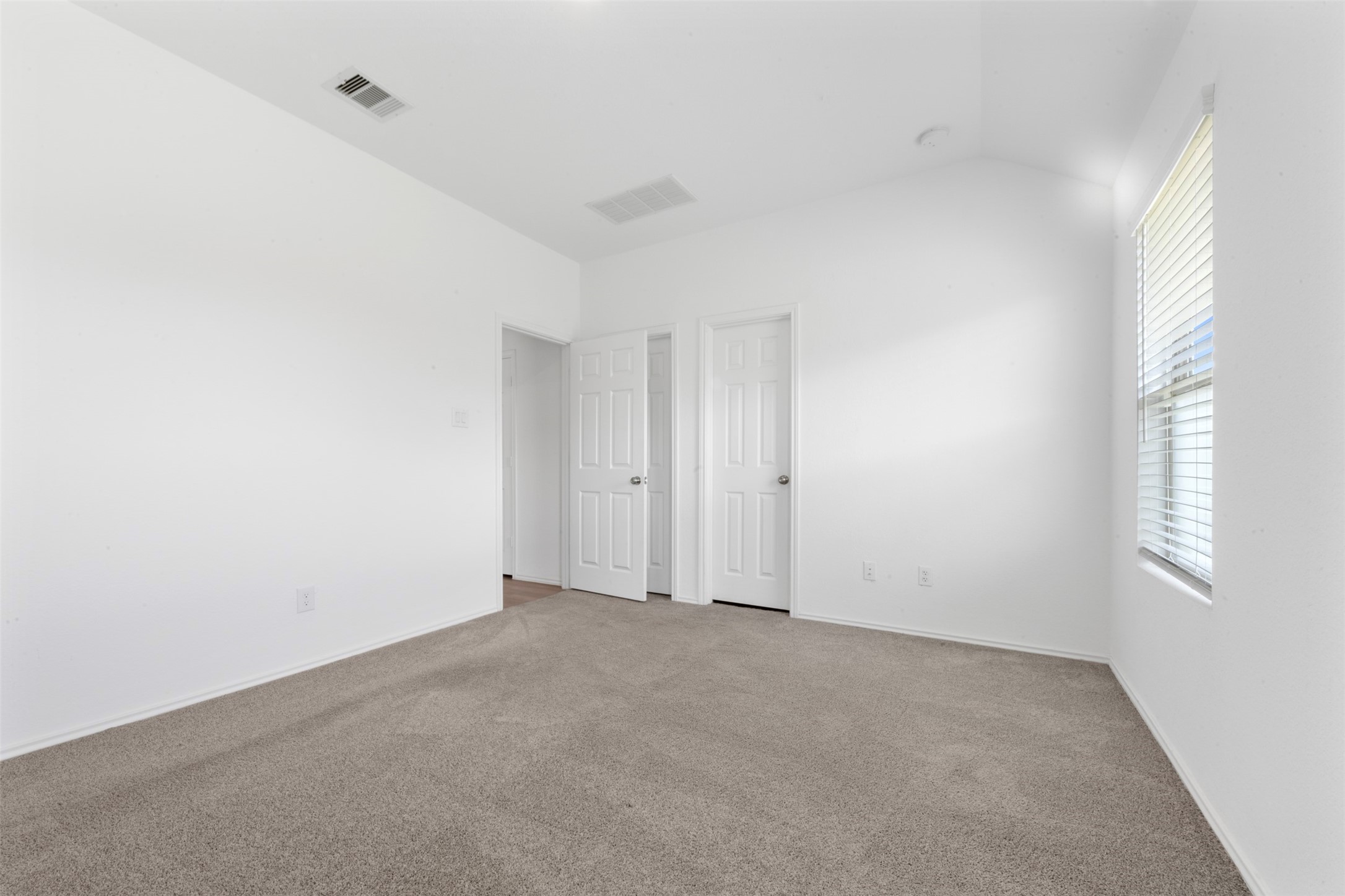14506 Broadbury Pond Road Rosharon, TX 77583 - Photo 16 of 25 a view of an empty room with windows