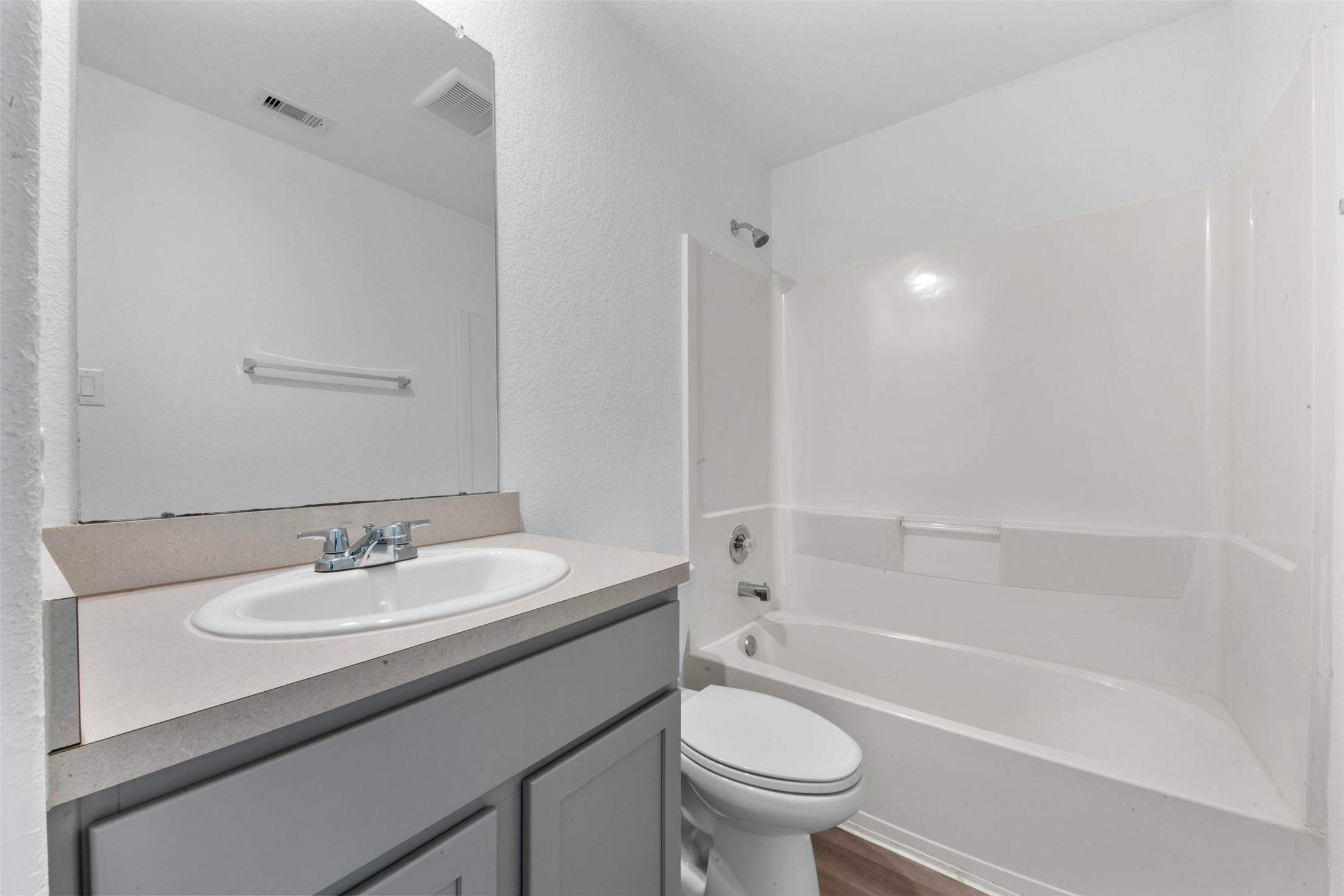 14506 Broadbury Pond Road Rosharon, TX 77583 - Photo 20 of 25 a bathroom with a sink a toilet and shower