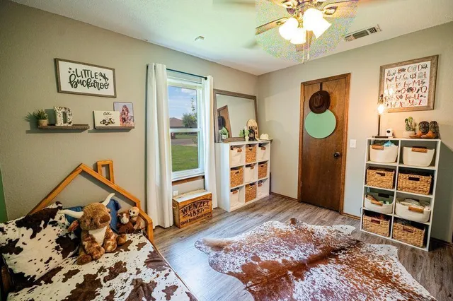 a bedroom with a bed and a closet