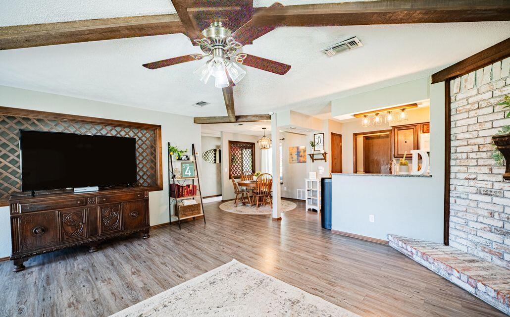 2914 Kermit Drive Plainview, TX 79072 - Photo 6 of 18 a living room with furniture and a flat screen tv