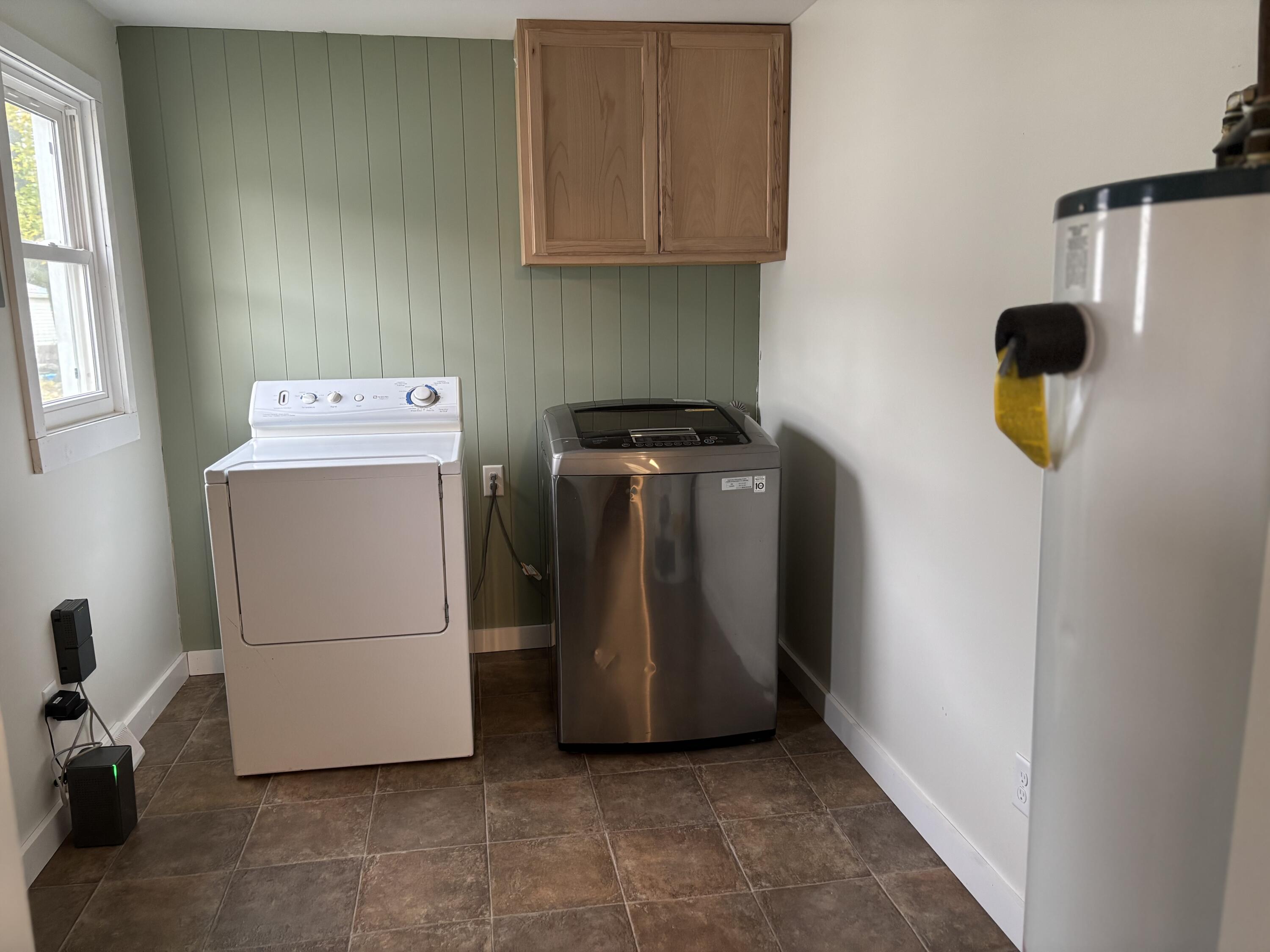 212 South Milton Street Rensselaer, IN 47978 - Photo 7 of 14 a utility room with dryer and washer