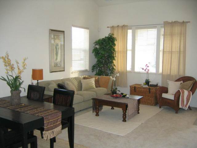 617 Rockspray Circle Pittsburg, CA 94565 - Photo 3 of 6 a living room with furniture and a potted plant