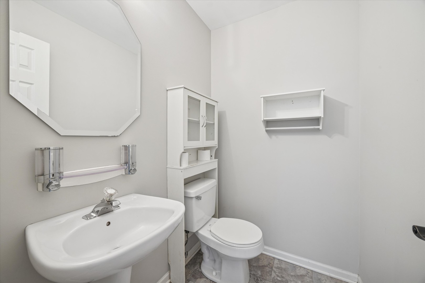 117 Enclave Circle, Unit C Bolingbrook, IL 60440 - Photo 14 of 19 a bathroom with a sink and a toilet