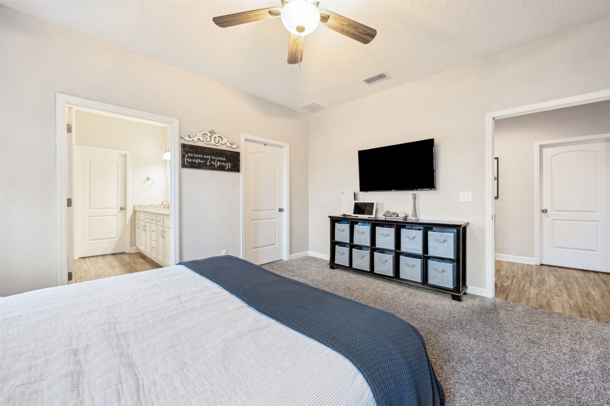 96718 Blackrock Road Yulee, FL 32097 - Photo 32 of 54 a bedroom with a bed and a flat screen tv