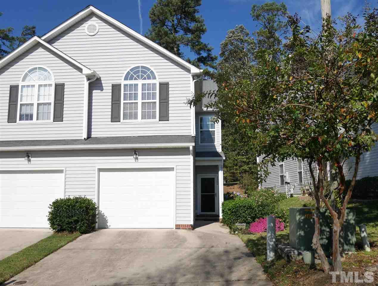 2300 Persimmon Ridge Drive Raleigh, NC 27604 - Photo 1 of 20 a view of a house with a yard and potted plants