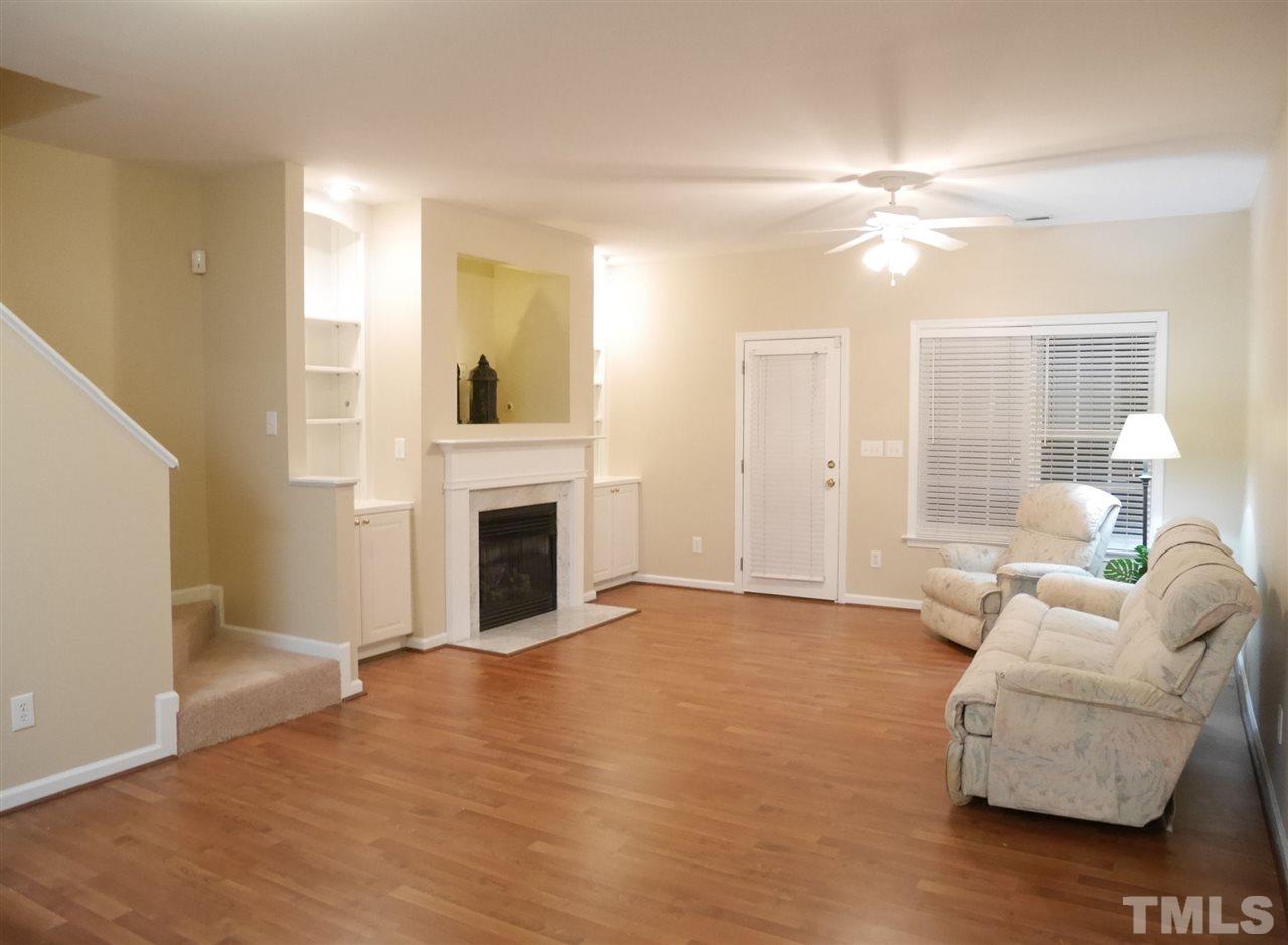 2300 Persimmon Ridge Drive Raleigh, NC 27604 - Photo 4 of 20 a living room with furniture and a fireplace