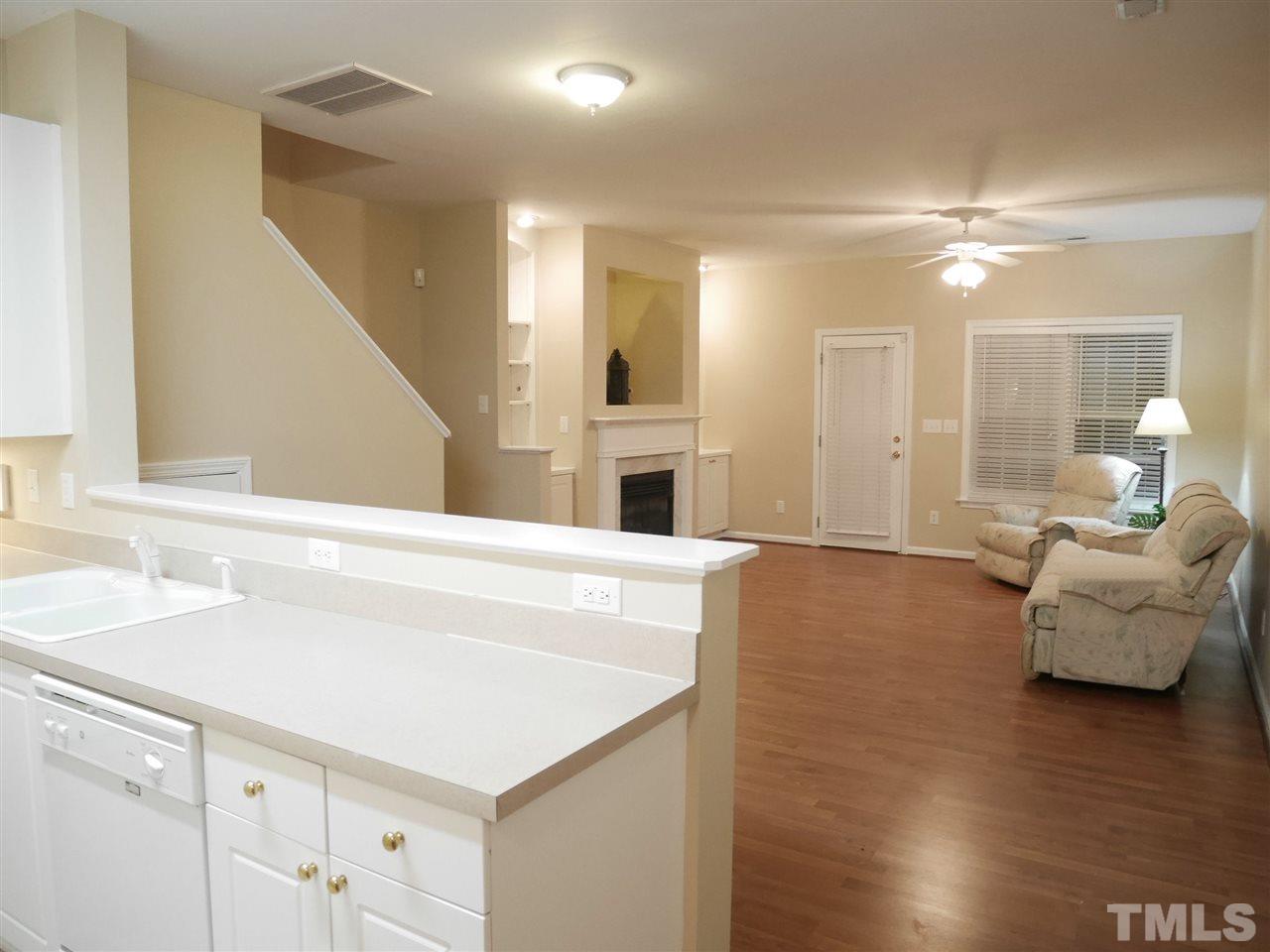 2300 Persimmon Ridge Drive Raleigh, NC 27604 - Photo 5 of 20 a living room with furniture and wooden floor