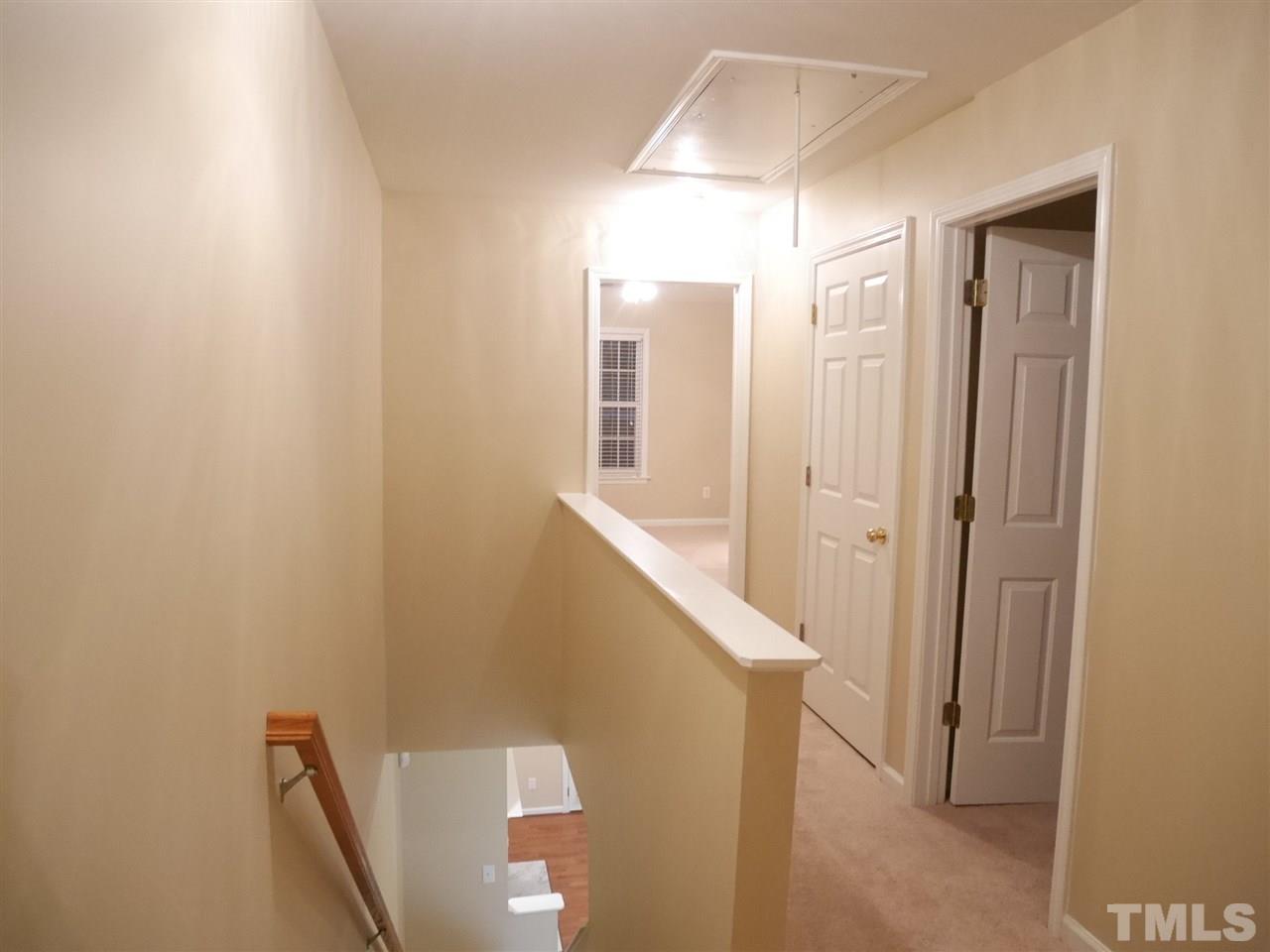2300 Persimmon Ridge Drive Raleigh, NC 27604 - Photo 9 of 20 a view of a hallway with entryway