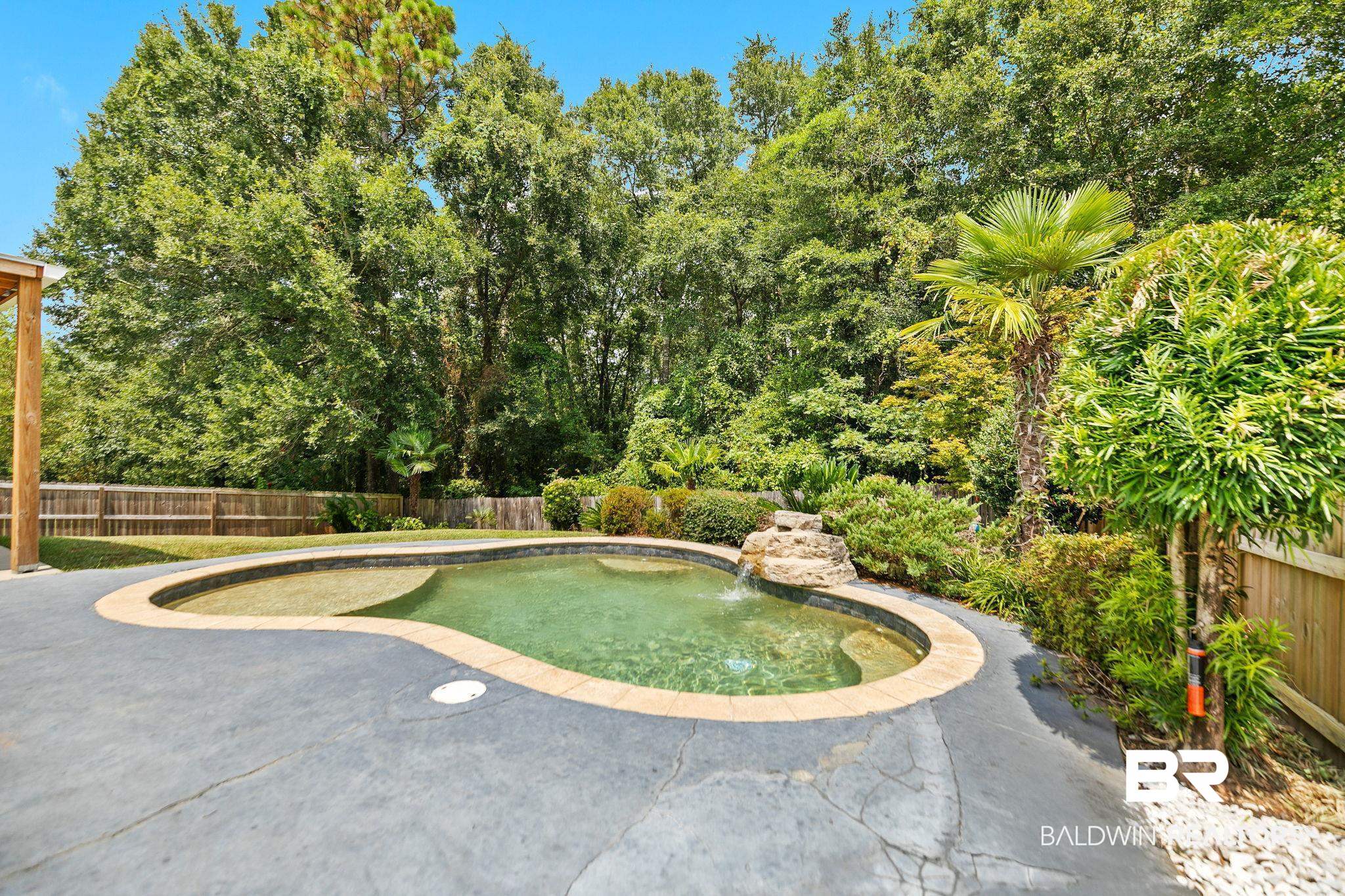 28246 Turkey Branch Drive Daphne, AL 36526 - Photo 32 of 41 View of swimming pool featuring pool water feature and a patio