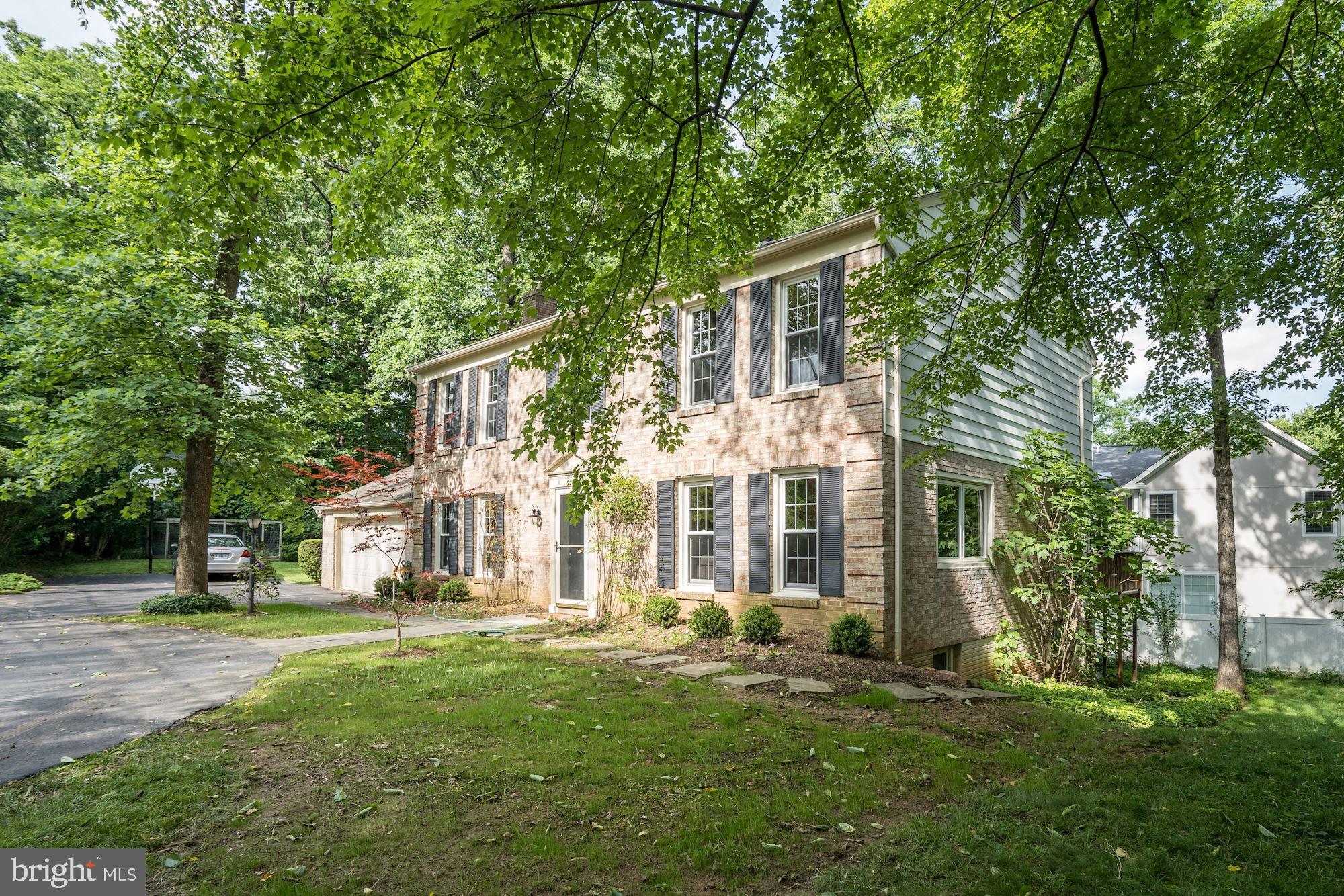 Flag stone walk way leads to deck and basement