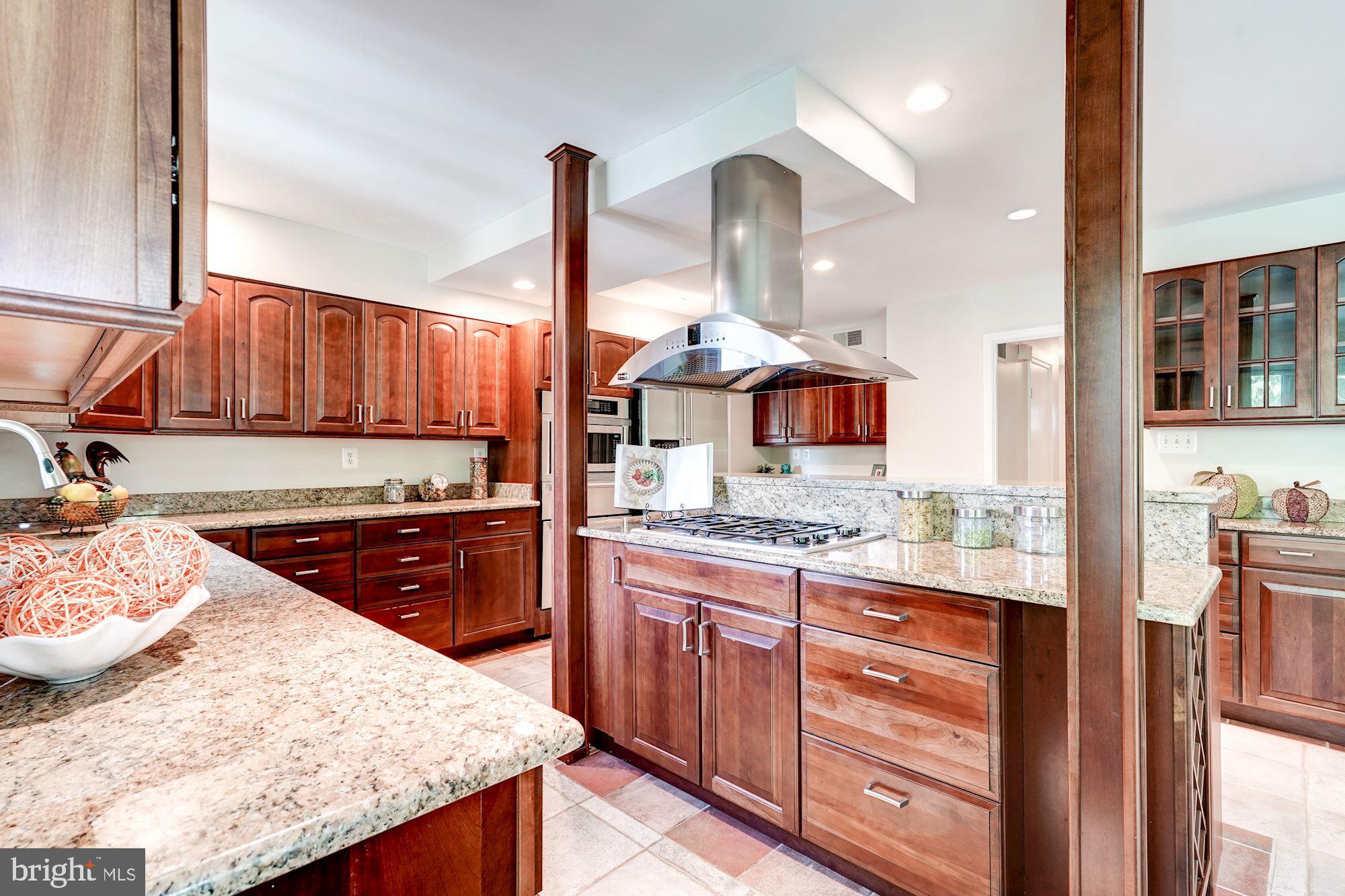 9219 Fernwood Road Bethesda, MD 20817 - Photo 11 of 29 The chef in in your family will love the flow!