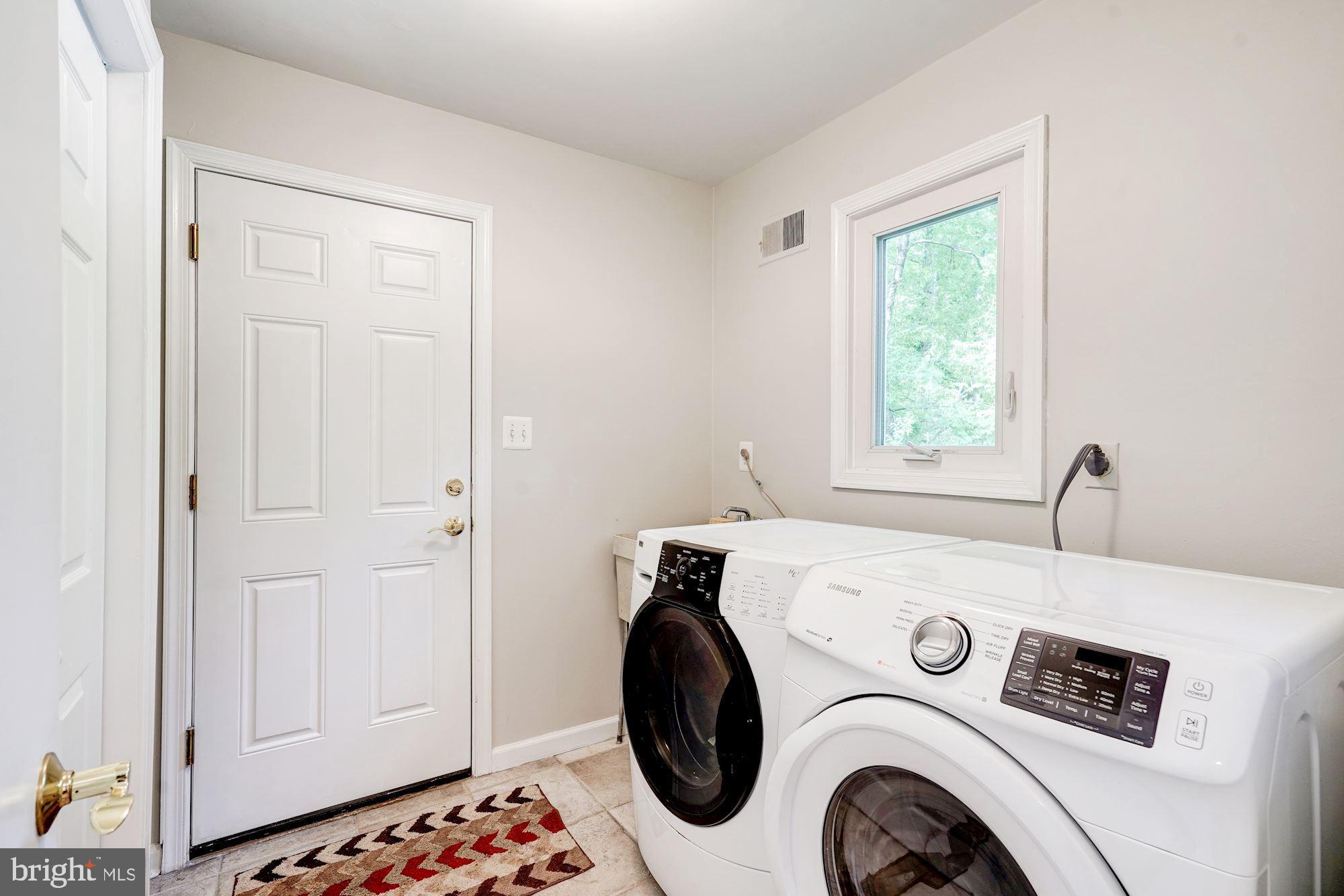 9219 Fernwood Road Bethesda, MD 20817 - Photo 15 of 29 Main level laundry with spacious pantry