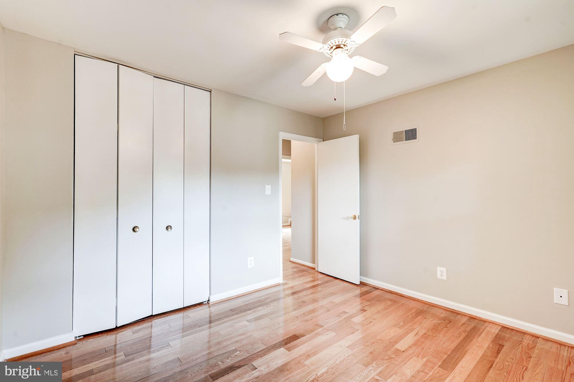 9219 Fernwood Road Bethesda, MD 20817 - Photo 23 of 29 Upper level third bedroom with cute ceiling fan