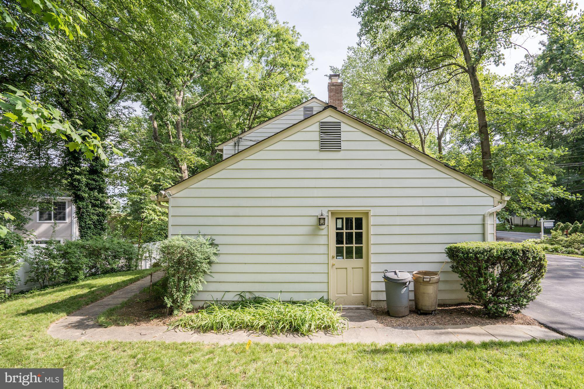 9219 Fernwood Road Bethesda, MD 20817 - Photo 27 of 29 Garage opens to spacious side yard & veg. garden
