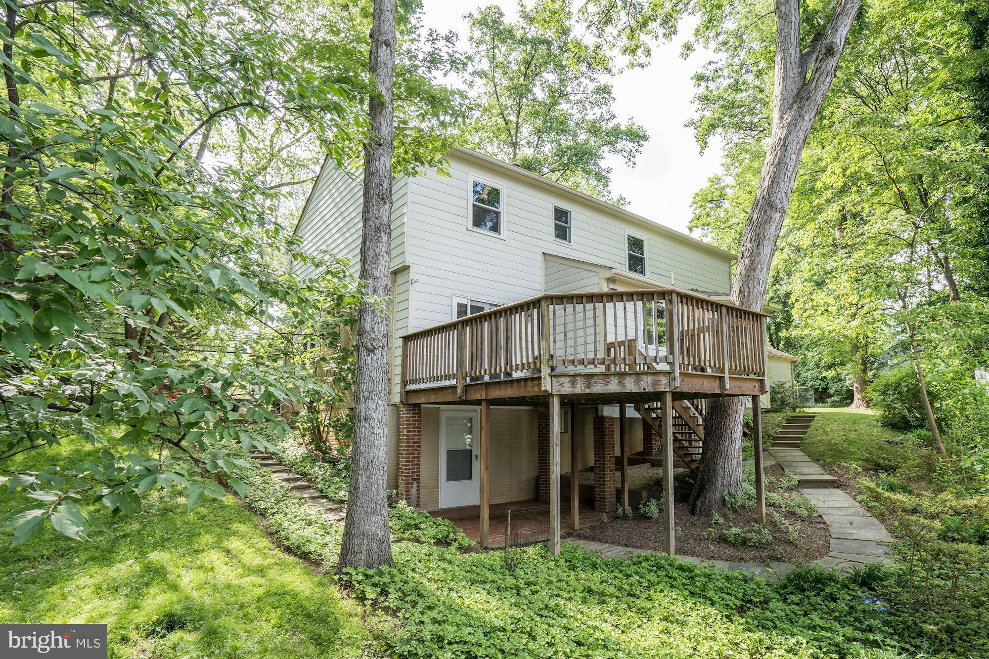 9219 Fernwood Road Bethesda, MD 20817 - Photo 29 of 29 Rear view shows walk way around the house