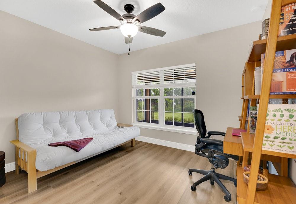 9054 Lincoln Road St. Cloud, FL 34773 - Photo 17 of 33 a living room with furniture and a large window