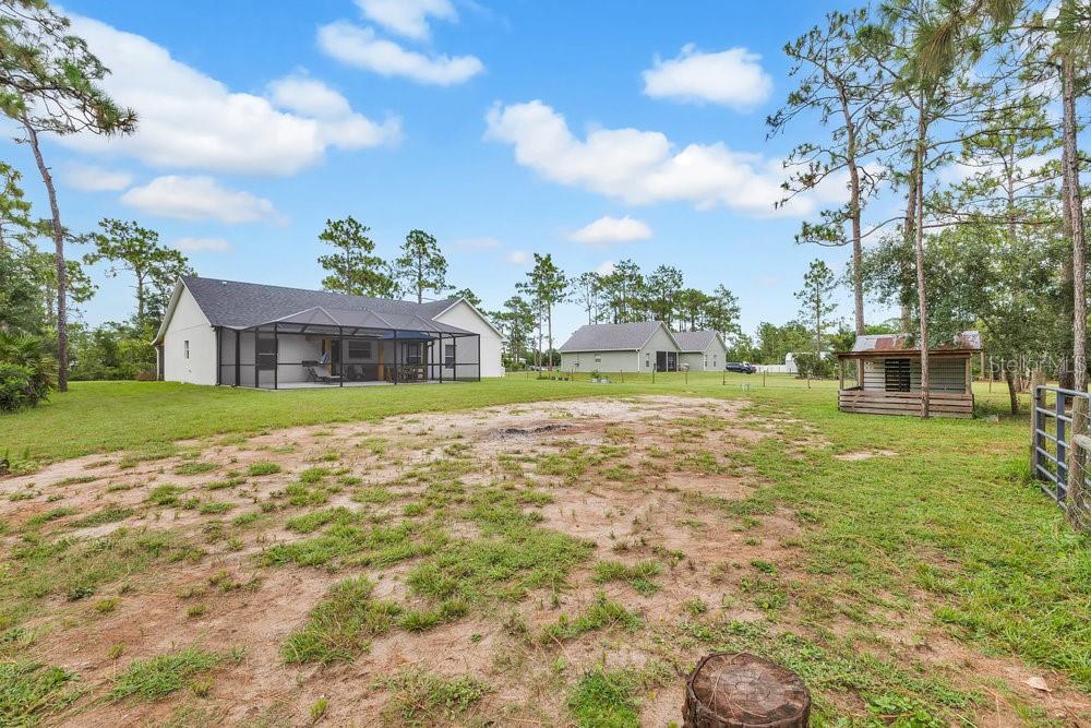 9054 Lincoln Road St. Cloud, FL 34773 - Photo 29 of 33 a view of house with garden
