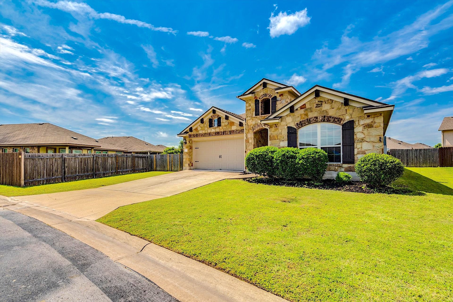 16829 Ruggio Road Pflugerville, TX 78660 - Photo 5 of 40 a front view of a house with a yard