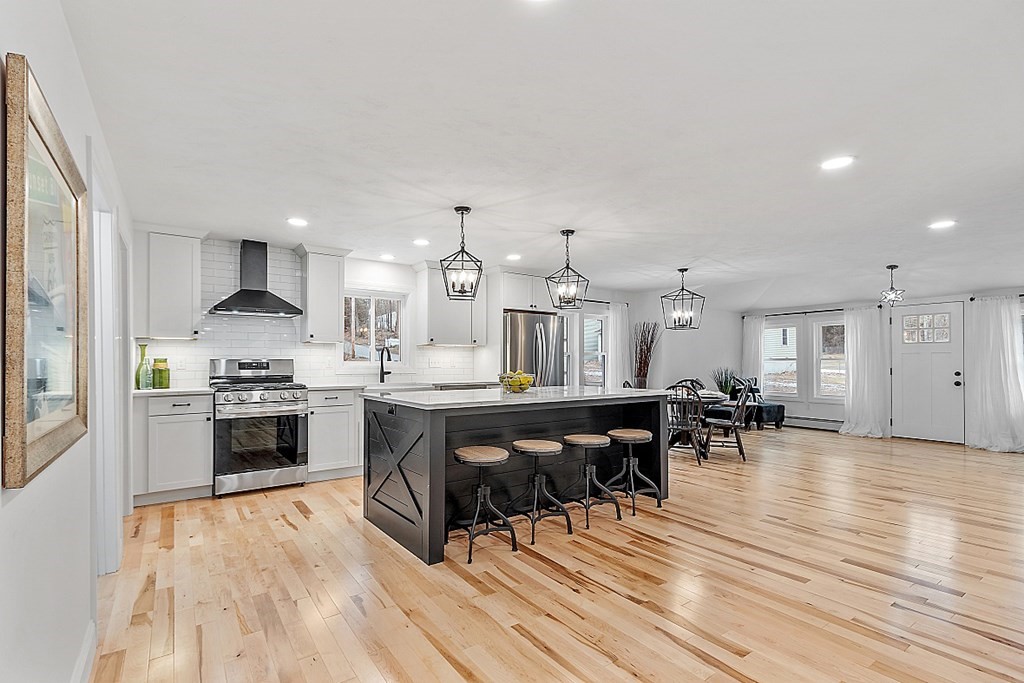 22 Brooks Village Road Templeton, MA 01468 - Photo 4 of 42 a open kitchen with stainless steel appliances granite countertop a stove and a wooden floors