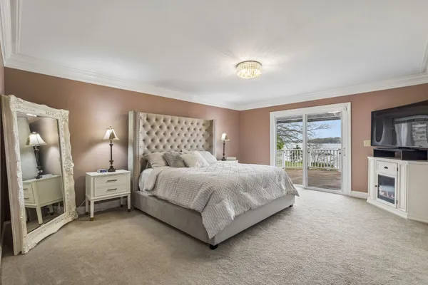 a view of an empty room with a bench