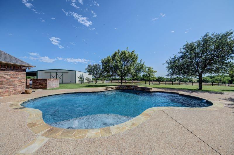 334 Farm To Market Road 2264 Decatur, TX 76234 - Photo 10 of 40 a view of a swimming pool and outdoor space
