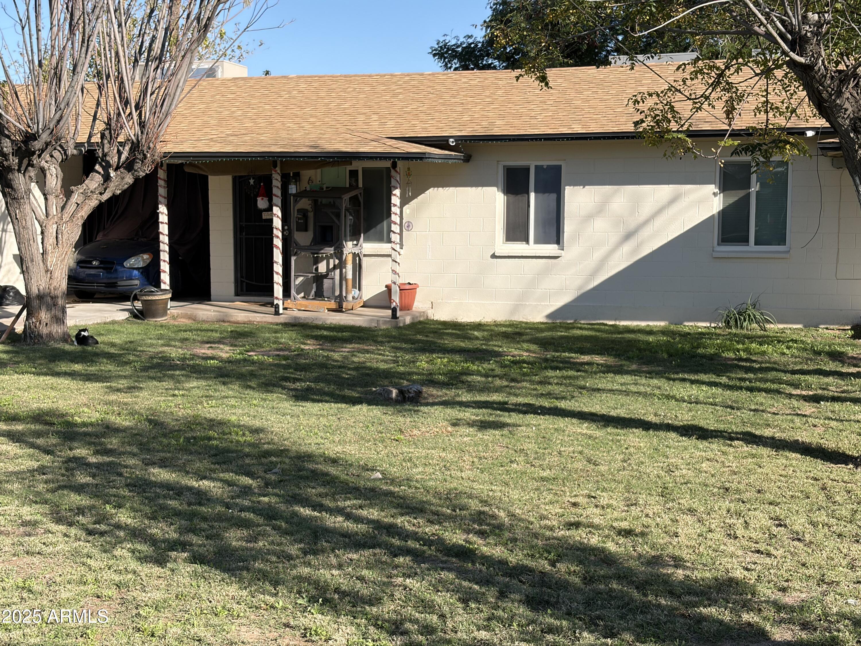 5963 West Ocotillo Road Glendale, AZ 85301 - Photo 12 of 12 a view of a house with a yard