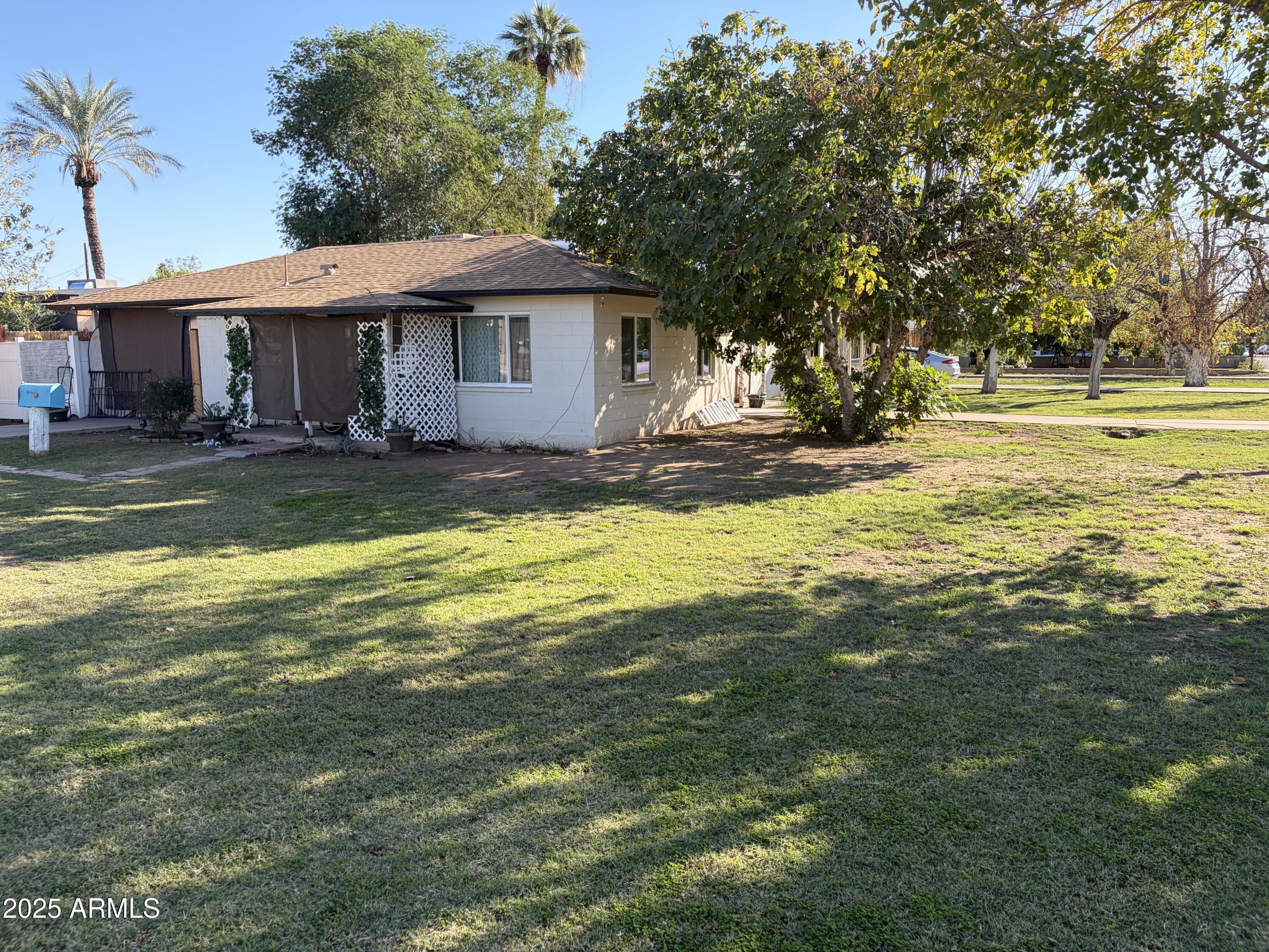 5963 West Ocotillo Road Glendale, AZ 85301 - Photo 6 of 12 a view of a house with a swimming pool